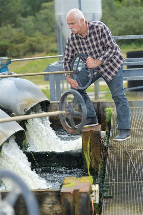 an engineer controlling a quality of water | Stock image | Colourbox