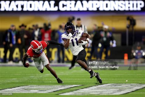 Derius Davis of the TCU Horned Frogs runs after a catch in the third... News Photo - Getty Images