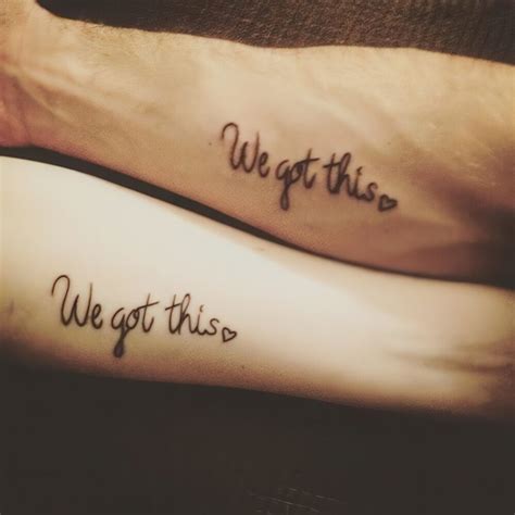 Picture Of arm phrase tattoo (we got this love)