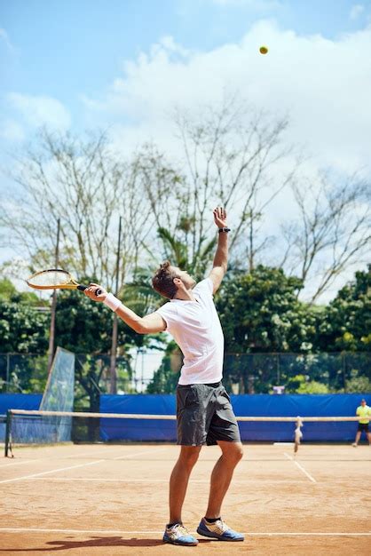 Premium Photo | The serve shot of a tennis player serving