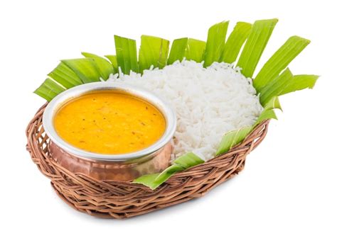 Premium Photo | Indian traditional cuisine dal fry or rice on white background