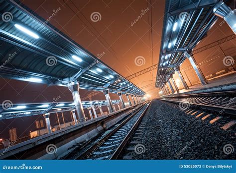 Railway Station At Night. Train Platform In Fog. Railroad Stock Photo ...