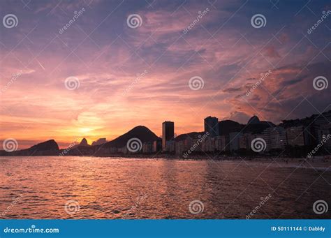 Sunset in Copacabana Beach stock photo. Image of atlantic - 50111144