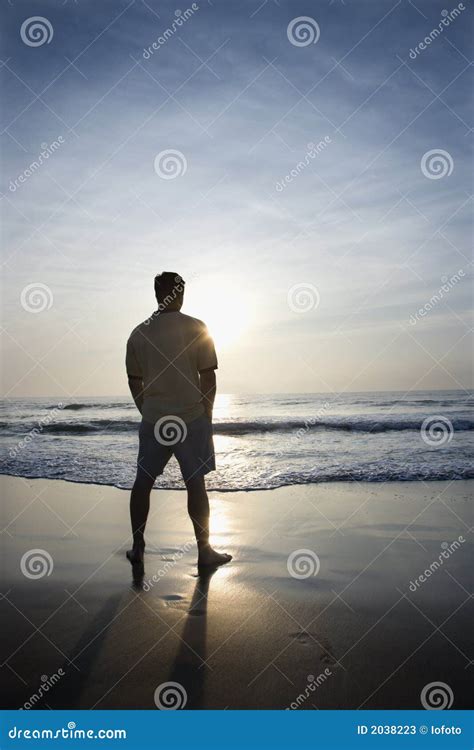 Man Alone On Beach. Stock Photos - Image: 2038223