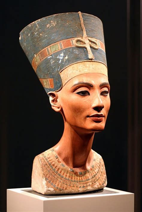 A painted limestone bust of Egyptian Queen Nefertiti, wife of Pharaoh Akhenaten, created over ...