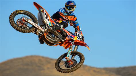 Man On Orange Dirt Bike With Helmet In Blue Sky Background 4K HD Dirt Bike Wallpapers | HD ...