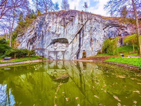 Lion of Lucerne Monument in the Rock with Memorial Pond in Lucerne ...