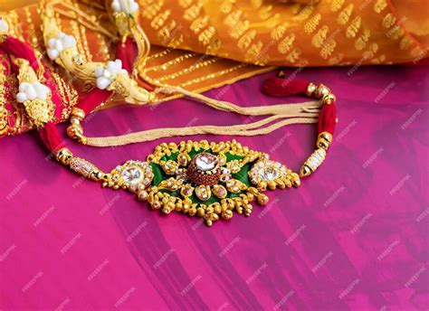Premium AI Image | Mangalsutra or Golden Necklace to wear by a married hindu women arranged with ...