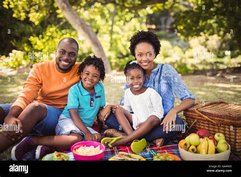 Happy family posing together Stock Photo - Alamy