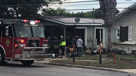 One dead, another injured after car crashes into Orlando home