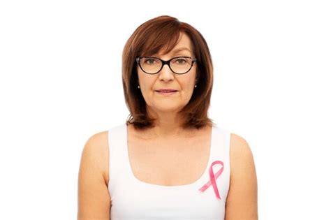 Premium Photo | Old woman with pink breast cancer awareness ribbon