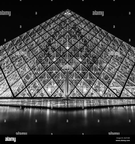 Louvre pyramid water Black and White Stock Photos & Images - Alamy