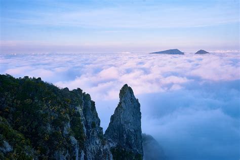 gray clouds over jagged mountain peaks, mountain ridge in the evening ...