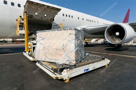 Loading cargo plane Stock Photo by ©pierivb 110207520