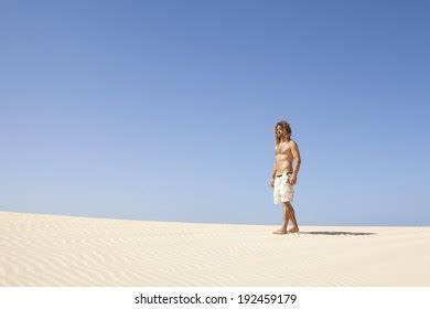 Young Man Walking Alone Desert Stock Photo 191139632 | Shutterstock