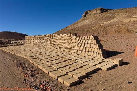 Adobe mud bricks drying and stacked ready for use photo WP44015