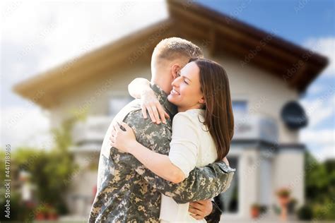 Happy Wife Hugging Her Husband Stock Photo | Adobe Stock