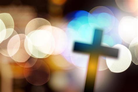 beautiful bokeh with cross in the background, concept for religion and ...