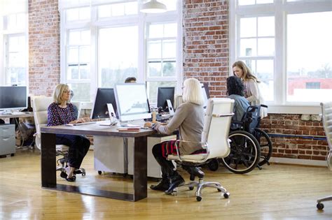 Business people working at desk in office stock photo