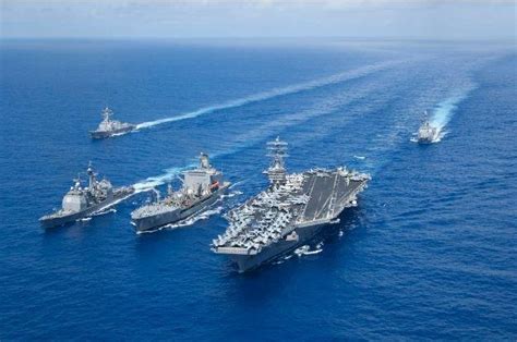 Aircraft carrier strike groups Nimitz, Reagan team up in Philippine Sea ...