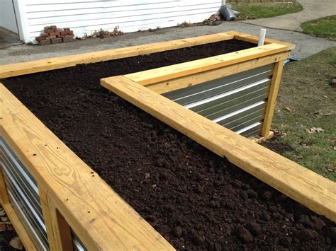 Building a Self Watering Raised Garden Bed – Frugal Living