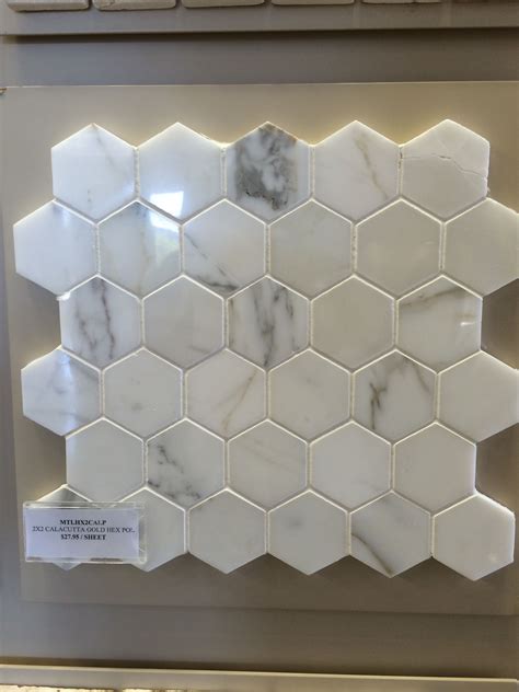 Hex Carrara marble mosaic from Olympia Tile. Shower tile? | Shower tile, Olympia tile, Marble mosaic