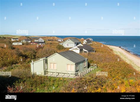 Beach Houses near Low Newton-By-The-Sea in Embleton Bay, Northumberland, England, UK Stock Photo ...