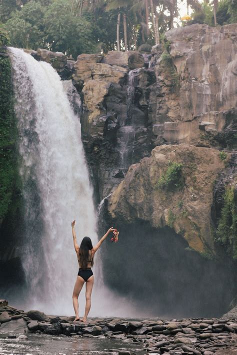 On our second morning in Ubud, we took a trip to Tegenungan Waterfall right before sunrise, and ...