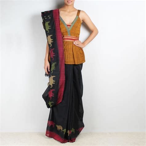 Kasuti traditonal motif on a plain black saree ... love it ! via | Saree designs, Trendy sarees ...