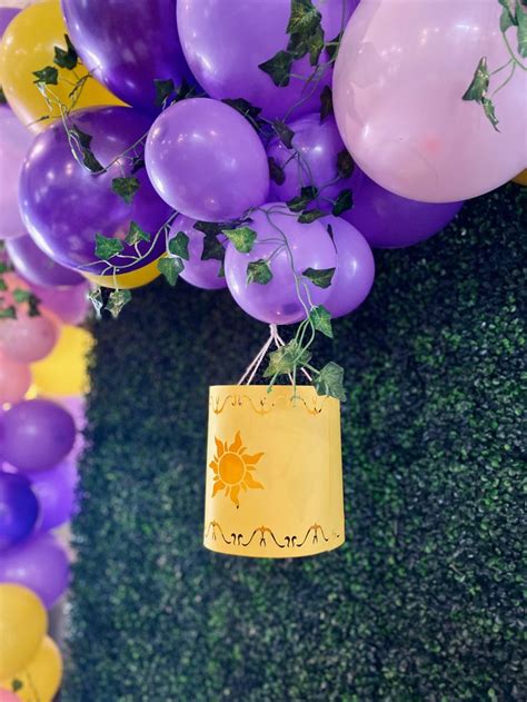 Balloons in tangled colors and ivy intertwined into balloons with ...