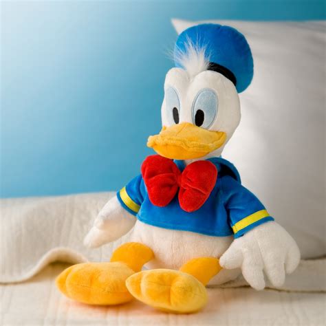 Donald Duck, plush toy on the sofa