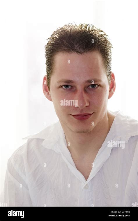 Young man smiling portrait Stock Photo - Alamy