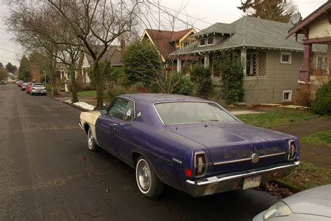 OLD PARKED CARS.: 1968 Ford Torino GT.