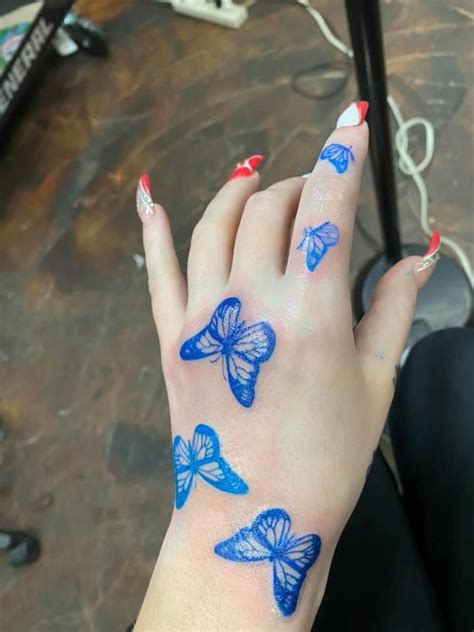 Butterfly Hand Tattoo Red - Butterfly Mania