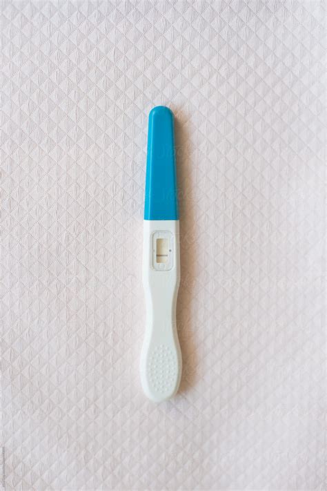 "Pregnancy Test Kit Showing Negative Result" by Stocksy Contributor "Alita ." - Stocksy