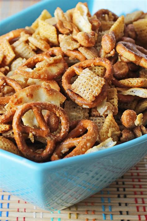 Savory honey mustard snack mix with gluten free pretzels, corn cereal, rice cereal, nuts and ...