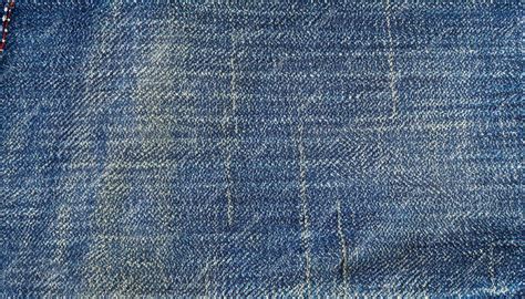 Premium AI Image | Jeans fabric texture background generative ai