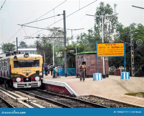 Passenger Train Stops at Katwa Junction Railway Station Platform. Katwa is a Kolkata Suburban ...