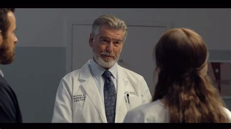 Ilana Glazer is suspicious of fertility doctor Pierce Brosnan in Hulu horror film ‘False ...