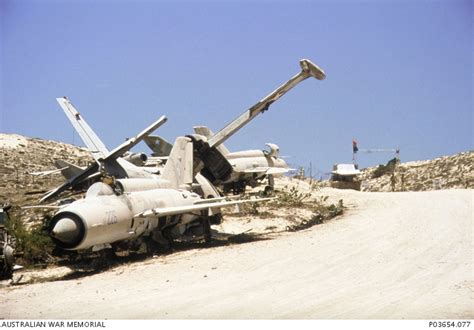 The remains of irreparable Somali Air Force Mig fighter aircraft on the edge of a road near the ...