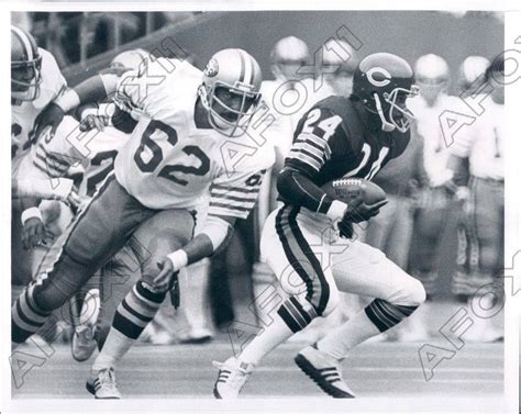 Randy Cross (wearing #62) in 1976 faces Virgil Livers (of Chicago Bears) as he intercepted ...