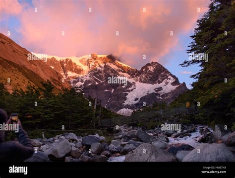 Hikers watch sunrise at Camp Italiano in Torres del Paine National Park, Chile Stock Photo - Alamy