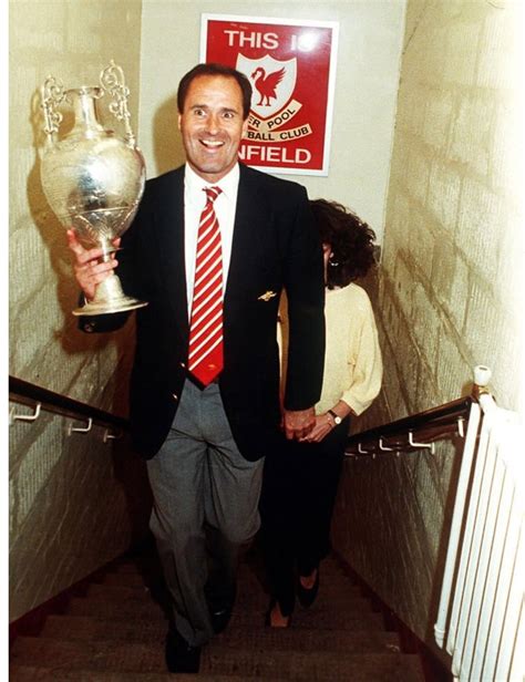 Former Arsenal manager George Graham holding the first division title ...