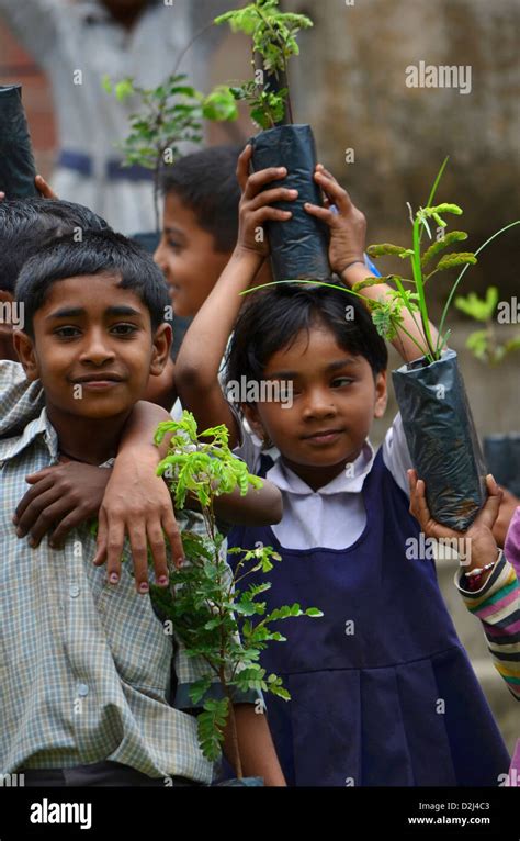 Children planting trees, India Stock Photo - Alamy