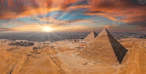 Magical sunset over the Egyptian pyramids. Aerial view of the Pyramids of Giza in Egypt ...