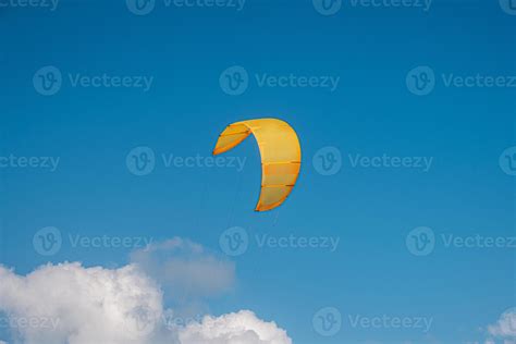 Kitesurfing parachute flies in the sky 7641107 Stock Photo at Vecteezy