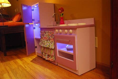 play kitchen inspiration... the fridge lights are magnetic drawer lights that come on when the ...