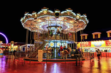 Pleasure Pier's Carousel ride at night Photograph by David Ilzhoefer - Fine Art America