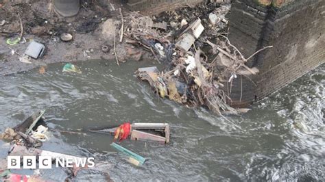 Brent Reservoir draining reveals tonnes of rubbish and 'secret river'