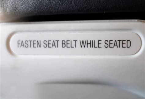 Download Fasten Seat Belt Sign on Plane | Free Stock Photo and Image | Picography